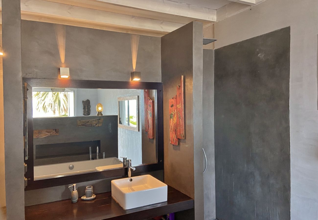 Bathroom with shower and bathtub