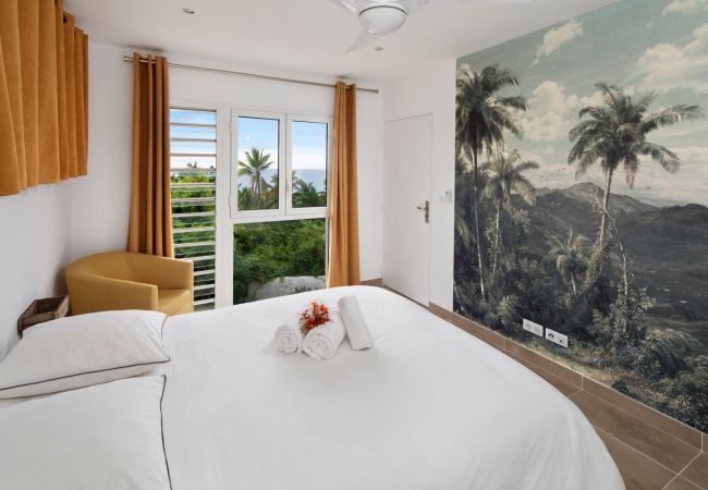 Chambre d'une villa Tropical Home